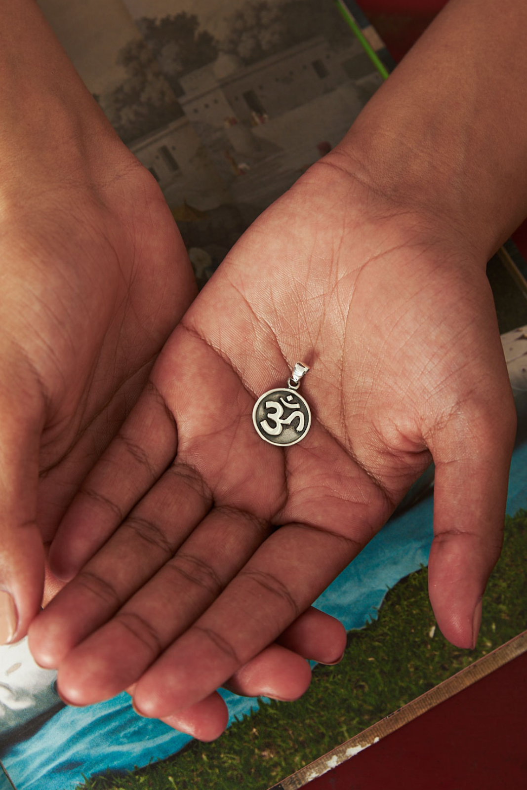 Om locket online design in silver