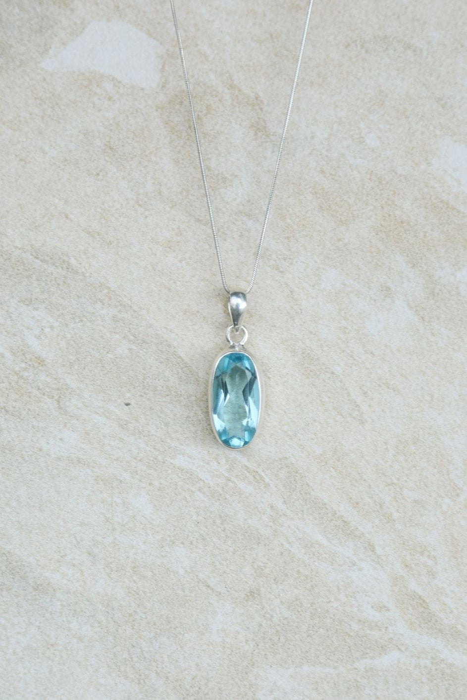 Oval Blue Topaz Pendant